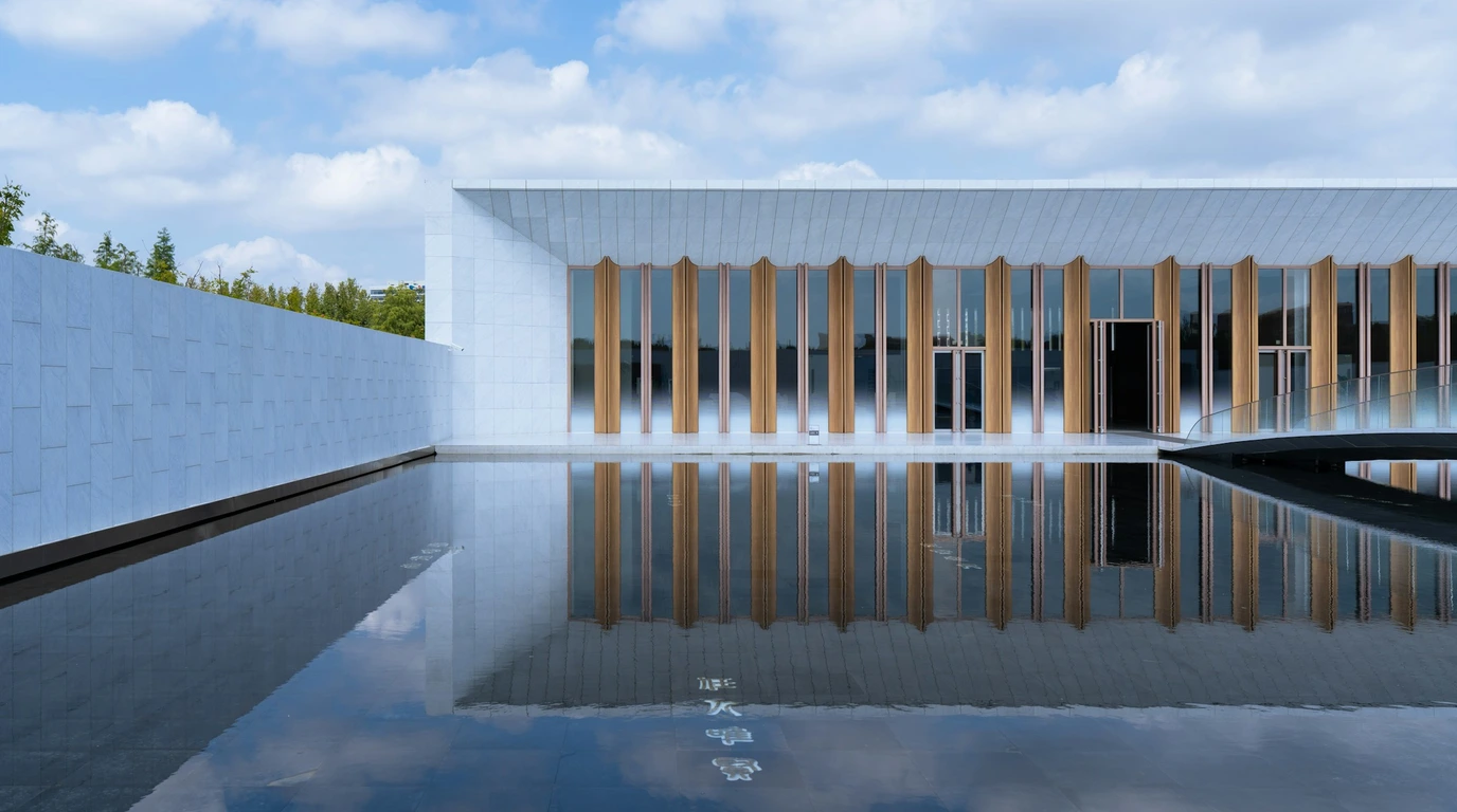 Illustrative reference: Modernist pavilion reflected in a still pool, with a wide architectural composition